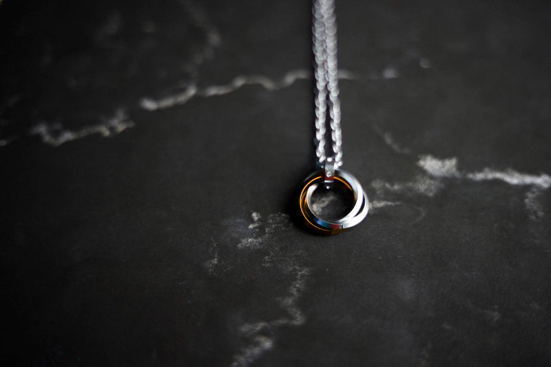 925 silver necklace on a granite top