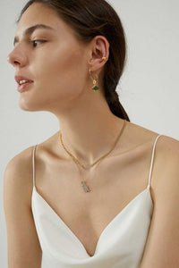 Stegosaurus 925 Sterling Silver Earring, 18K Yellow Gold Plating (Green)