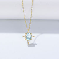 Blue Oval Natural Topaz Eightfold Star Necklace