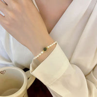 Created Jade and Shell Pearl 925 Sterling Silver Bracelet