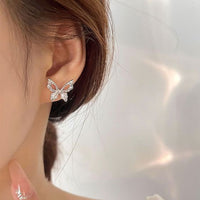 Hollow Flying Butterfly Sterling Silver Stud Earrings