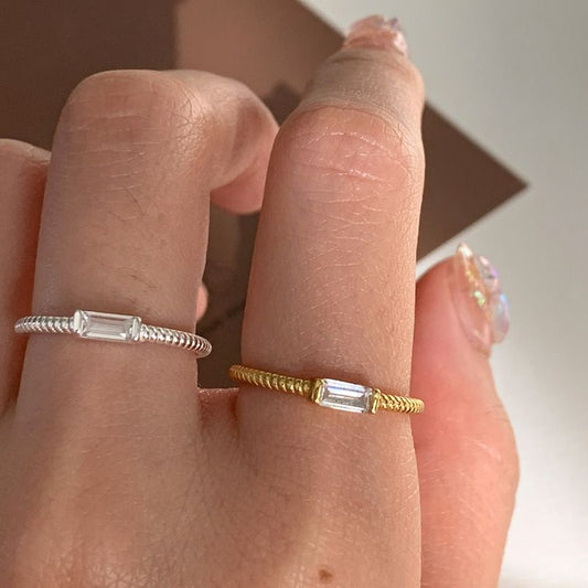 Geometry Baguette CZ Twisted Adjustable Ring