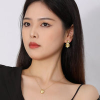 Gold Lotus Leaf Sterling Silver Drop Earrings