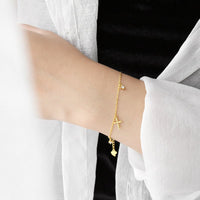 Silver Cubic Zirconia Cross Tassel Bracelet