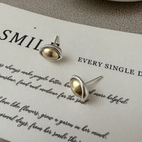 Geometric Gold and Silver Oval Stud Earrings