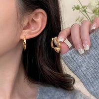 Elegant Twisted Circle Sterling Silver Hoop Earrings
