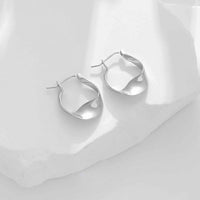 Elegant Twisted Circle Sterling Silver Hoop Earrings