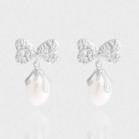 Oval Natural Pearl Bow-Knot Sterling Silver Drop Earrings