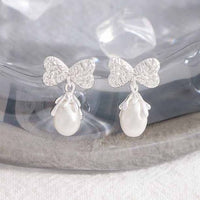 Oval Natural Pearl Bow-Knot Sterling Silver Drop Earrings