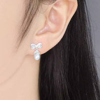 Oval Natural Pearl Bow-Knot Sterling Silver Drop Earrings