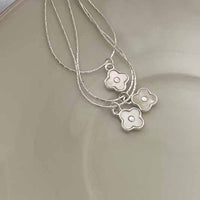 White Shell Four-Leaf Clover Sterling Silver Necklace