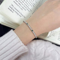 Heart-Shaped Green Cubic Zirconia Tennis Bracelet in Sterling Silver