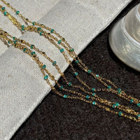 Geometric Multi-Layer Beaded Necklace with Green Accents in 925 Sterling Silver