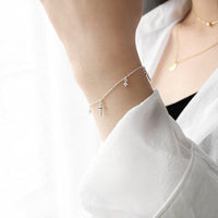 Silver Cubic Zirconia Cross Tassel Bracelet