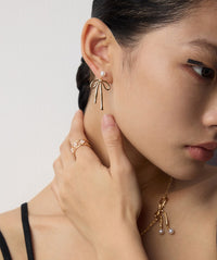 Natural Pearl Bow Earrings in Sterling Silver