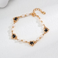 Gold Plated Pearl & Onyx Bracelet