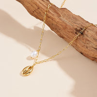 Gold Plated Sterling Silver Freshwater Pearl Sea Snail Necklace