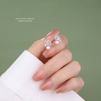 Hollow Flower Pearl Stud Earrings in Sterling Silver