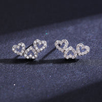 Sterling Silver Hollow Three Heart Stud Earrings