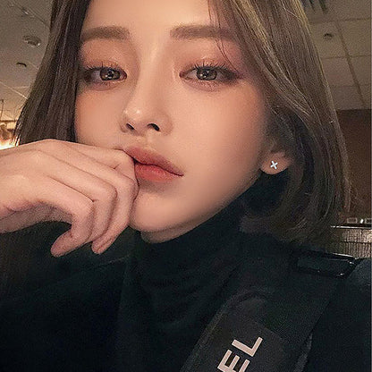 Tiny Cross Stud Earrings in Sterling Silver