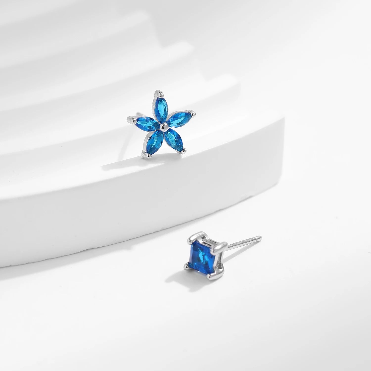 Sterling Silver Asymmetrical Flower Blue Stud Earrings