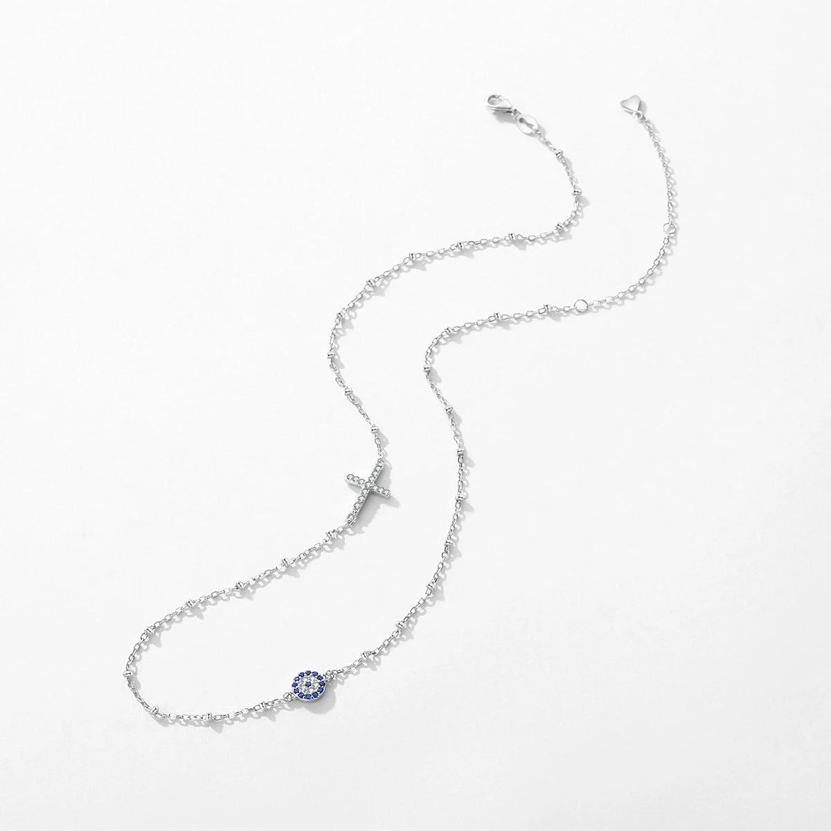 Sterling Silver Cross and Blue Zirconia Eye Link Chain Necklace