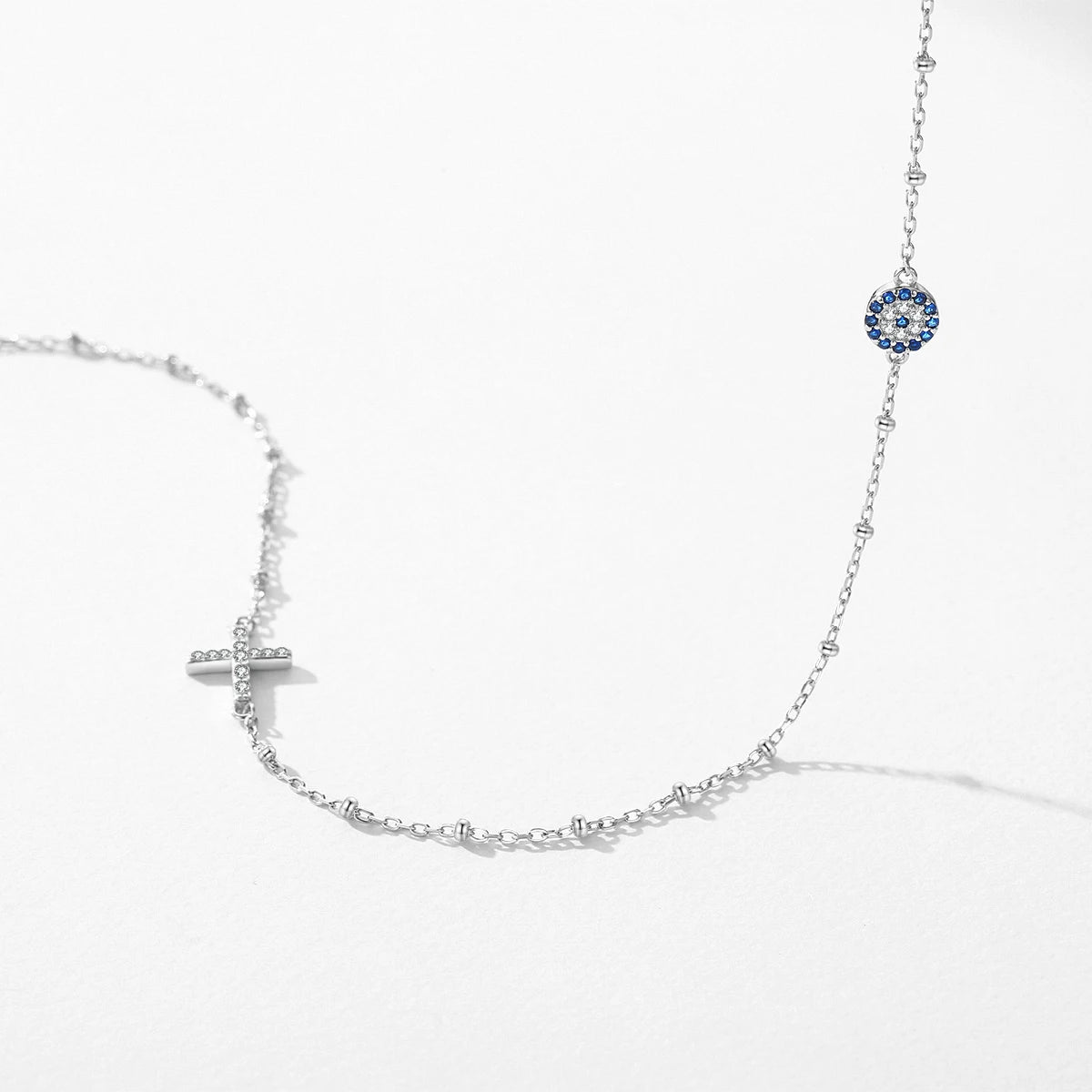 Sterling Silver Cross and Blue Zirconia Eye Link Chain Necklace