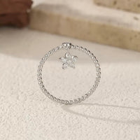 Moissanite Flower Drop Bead Ring in Sterling Silver