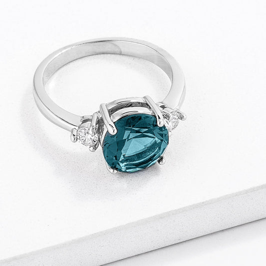 Peacock Blue Three-Stone CZ Engagement Ring