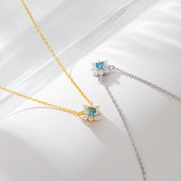 Gold Plated Silver Created Blue Topaz Flower Necklace